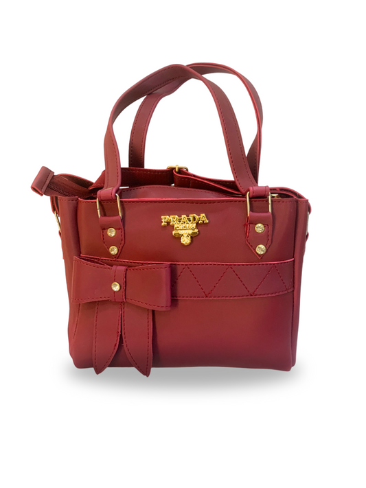 Elegant Maroon Handbag with Bow Accent